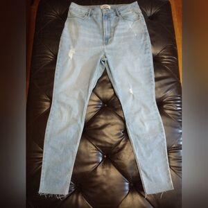 Wrangler High Rise Unforgettable Skinny Distressed Raw Hem Light Blue Jeans